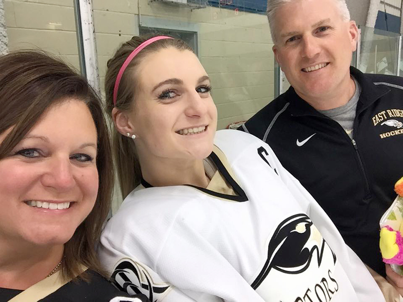 Andy Roeser with his wife and daughter.