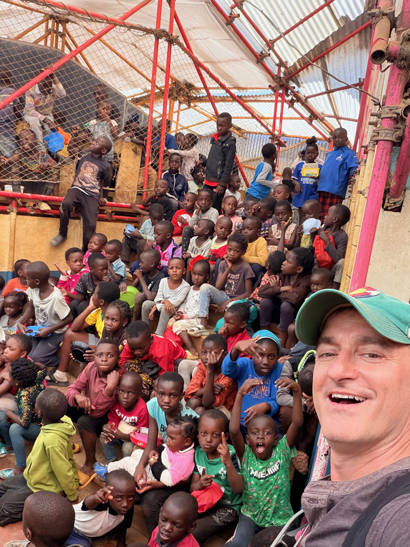 Don MacPherson with his class of Kenyan students that he sponsored