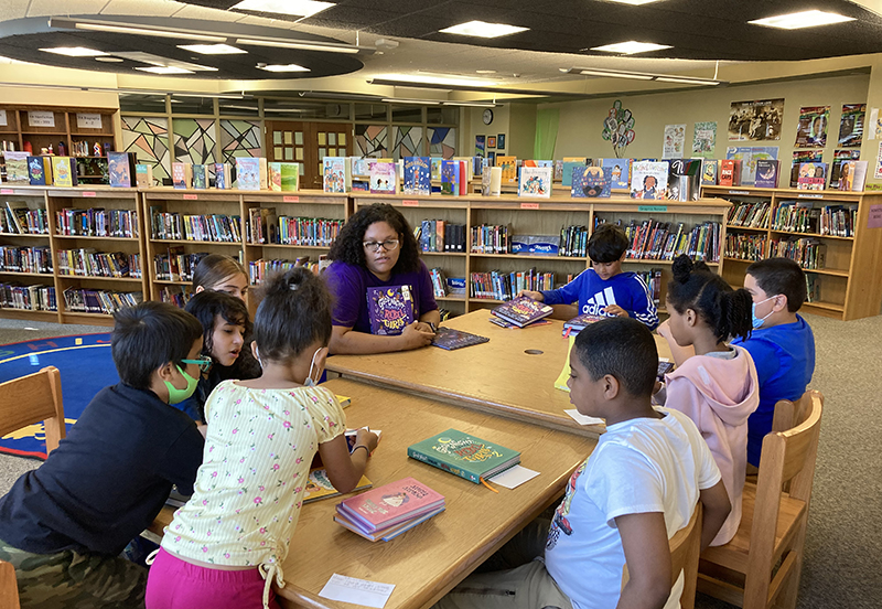 Jestine Ware reading to children