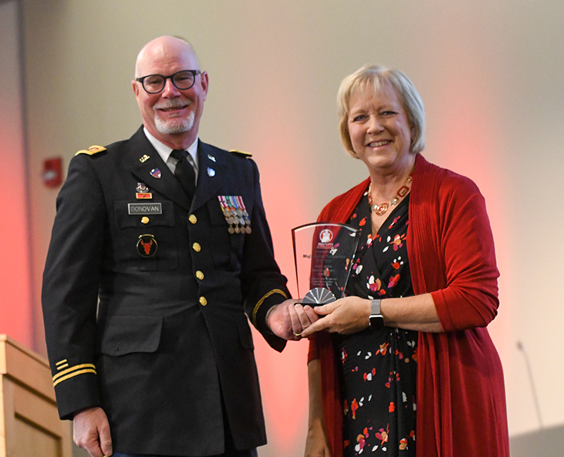 Maj. John Donovan receiving an award