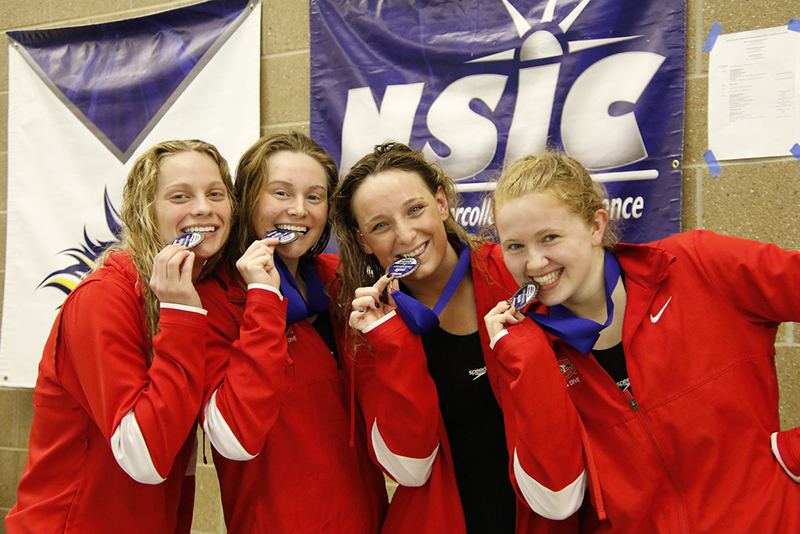 Kara Cowell with her swim relay team.