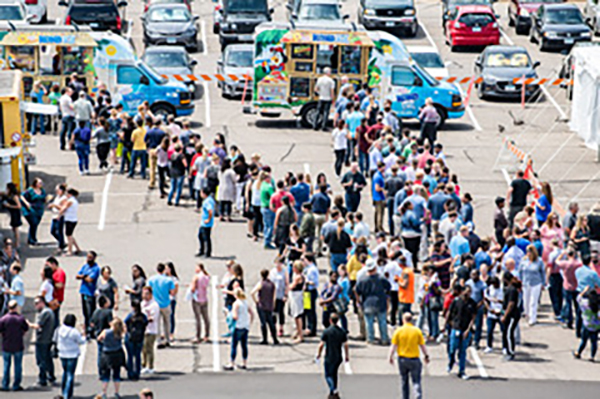 Photograph from above of a group participating in a charity walk.